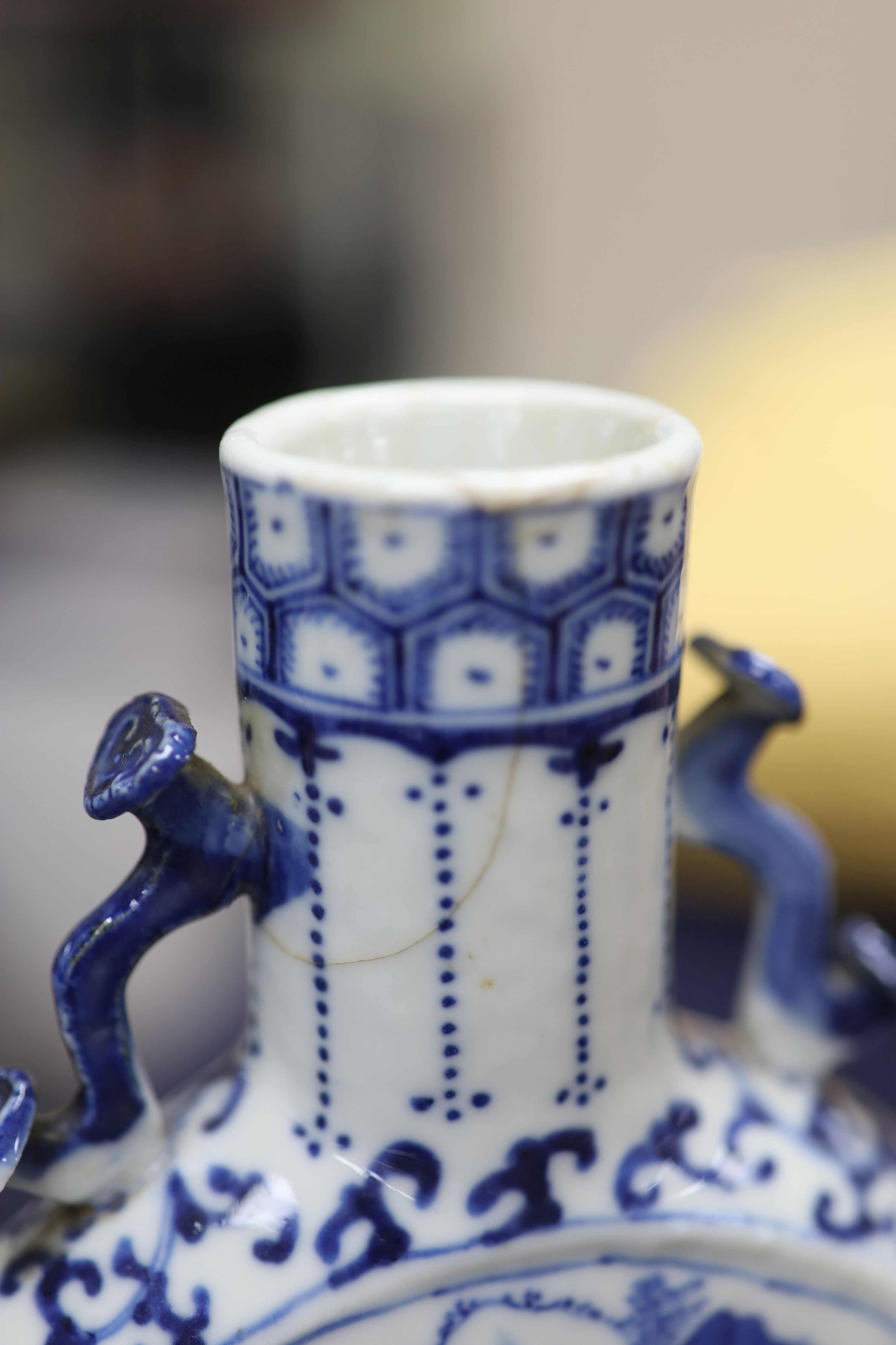 Two 19th century Chinese blue and white moon flasks and a teapot, tallest 21cm